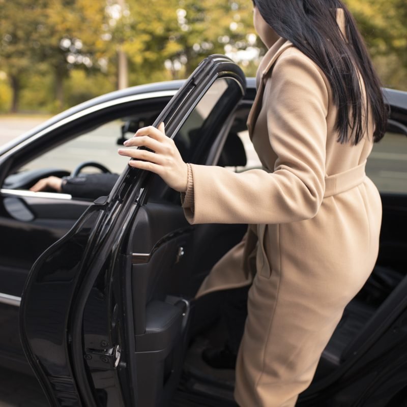 woman-getting-taxi-car